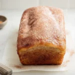 fresh cinnamon donut bread sliced on modern kitchen counter under natural daylight