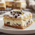 photorealistic image of classic cannoli squares with creamy ricotta filling and powdered sugar on marble countertop