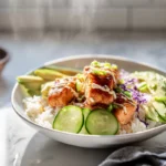 crispy salmon and rice bowl served on a modern plate in bright kitchen setting