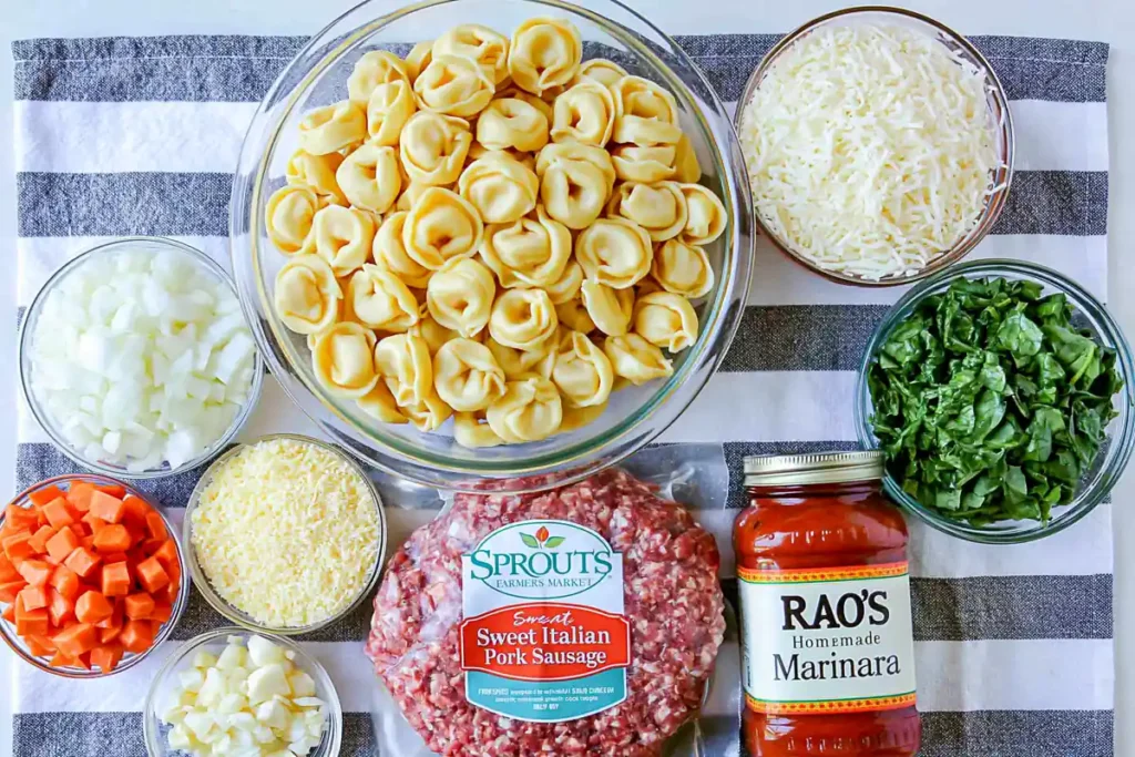 Easy Baked Tortellini Casserole for a Cozy Weeknight Dinner 33 Easy baked tortellini casserole ingredients with cheese tortellini Italian sausage spinach marinara mozzarella and vegetables