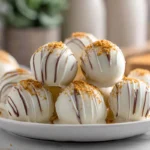 finished no-bake pumpkin cheesecake balls on plate in modern kitchen with natural daylight