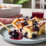 photorealistic hero shot of blueberry french toast casserole on modern kitchen counter