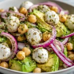 Chickpea Feta Avocado Salad served fresh on a plate in a bright home kitchen