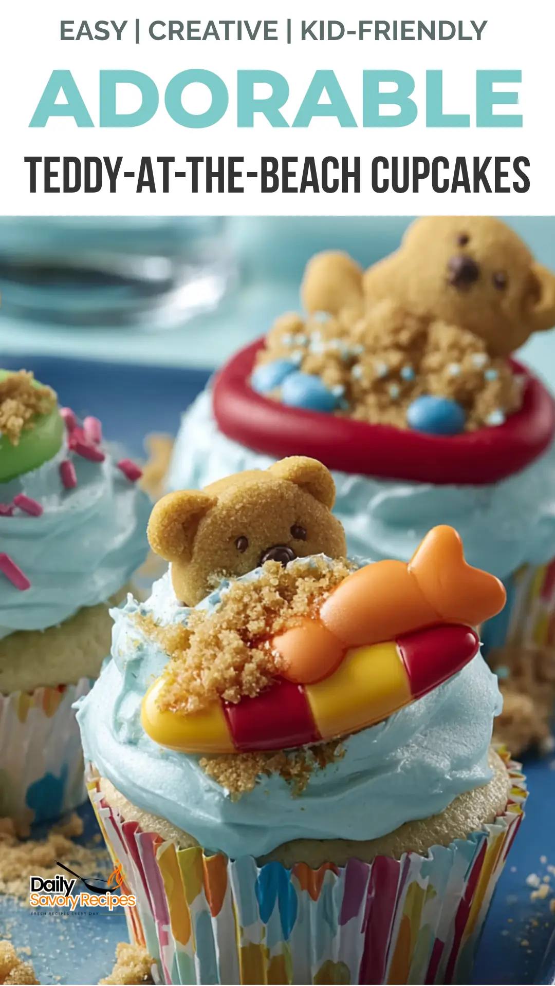 Teddy-at-the-Beach Cupcakes recipe with blue frosting, teddy grahams, candy rings, fruit snack strips, and graham cracker sand