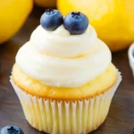 Chef Taha Ayad's Recipe Lemon Blueberry Cupcakes with cream cheese frosting and fresh blueberries