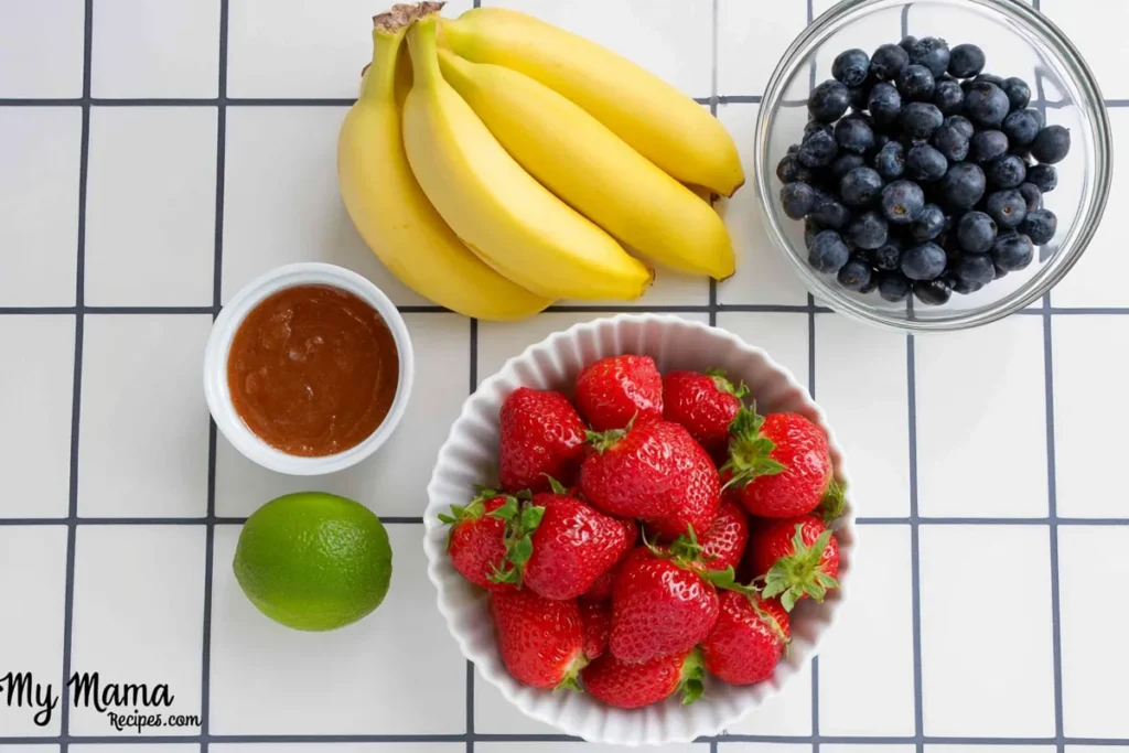 4th of July Fruit Salad With Honey Lime Dressing 10 4th of July fruit salad ingredients with strawberries blueberries bananas honey and lime