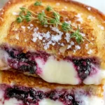 Blueberry Grilled Cheese recipe with lemon thyme jam and melted cheddar on golden toasted bread