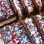 Patriotic mini ice cream sandwiches recipe with chocolate wafers, vanilla ice cream, and red white and blue sprinkles