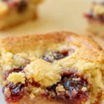 Sour Cherry Blondies recipe with golden blondie squares and tart cherry filling