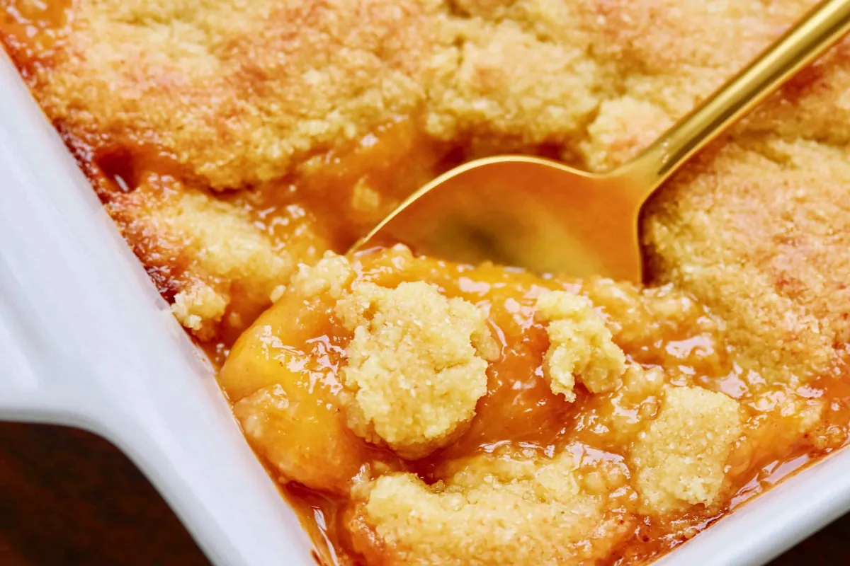 Chef Taha Ayad's Recipe Best Peach Cobbler with golden cookie-style topping