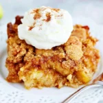 Chef Taha Ayad's Recipe Crumble Topping on a warm fruit dessert with cream