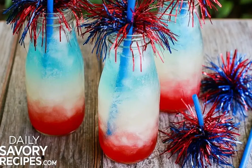 Non-Alcoholic Layered Drinks for Summer Parties 7 Non-alcoholic layered drinks with clean red white and blue layers served over ice