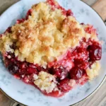 Chef Taha Ayad's Recipe Easy Cherry Crisp with golden topping and warm cherry filling
