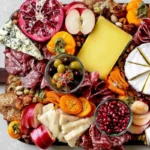 Chef Taha Ayad's Recipe Meat and Cheese Board with Gouda Camembert Prosciutto and Fall Fruit