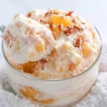 Chef Taha Ayad's Recipe Peach Dessert Salad in a Glass Bowl with Peaches and Pecans