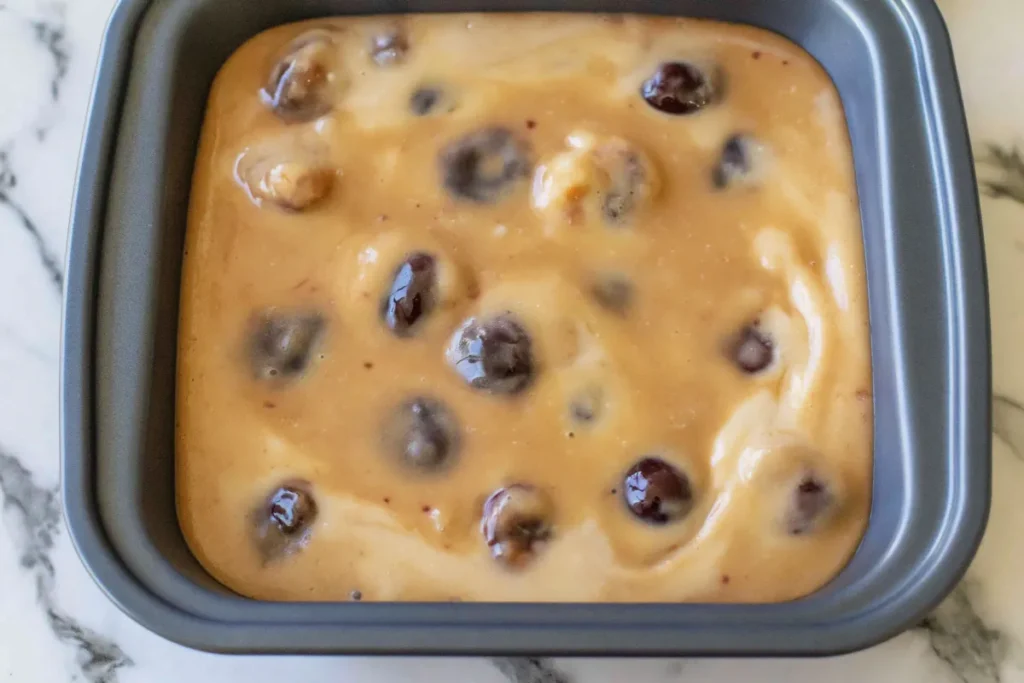 Sour Cherry Blondies with a Soft Toffee Center 15 Sour Cherry Blondies batter spread in an 8 inch square pan before baking
