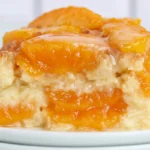 Chef Taha Ayad's Recipe The Girl Inspired Peach Cobbler Cheesecake with fresh peaches and cobbler crumble