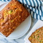 Vegan Zucchini Bread with Warm Spices and a Tender Crumb 36 Chef Taha Ayad's Recipe Vegan Zucchini Bread with a golden loaf and tender sliced crumb