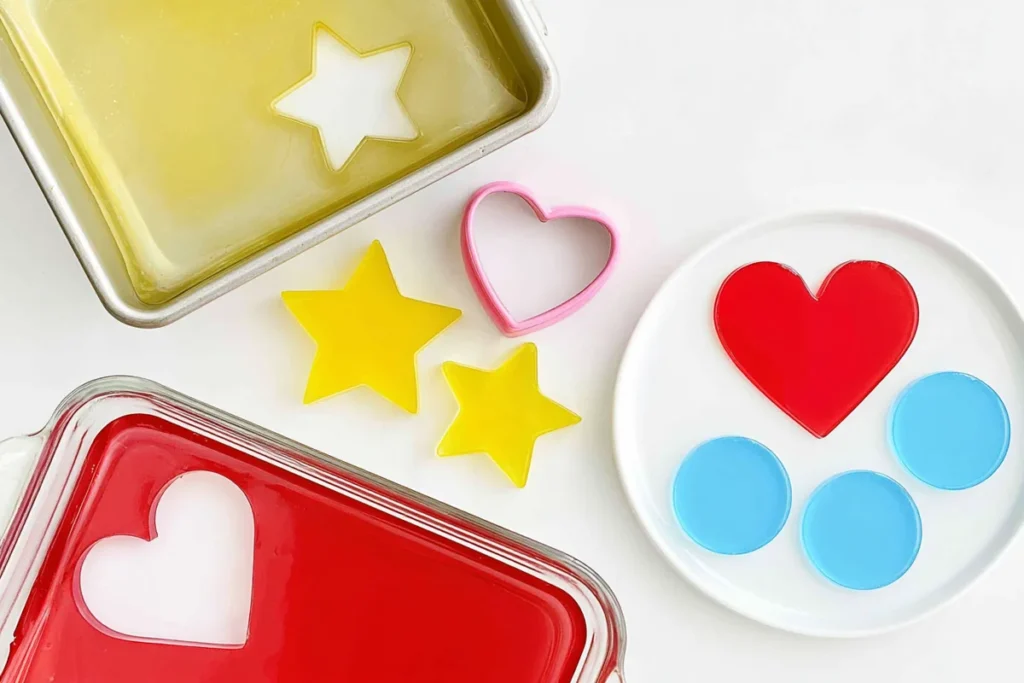 Jello Jigglers: A Firm, Colorful Finger Snack for Parties 6 Jello Jigglers cut into clean heart, star, and circle shapes from gelatin pans