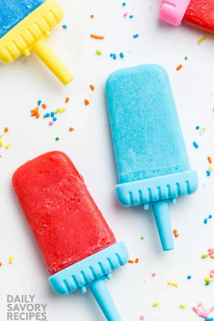 Easy Jell-O Popsicles That Hold Their Shape Longer 7 Four evenly frozen red and blue Jell-O Popsicles in reusable molds
