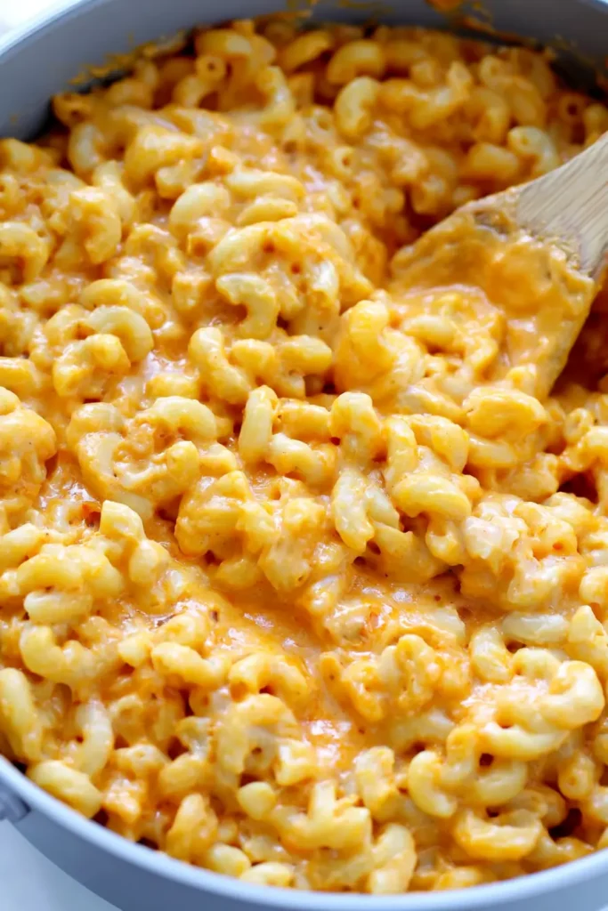 Veggie Mac & Cheese with a Creamy Roasted Vegetable Sauce 7 Creamy Veggie Mac & Cheese ready to serve from a home kitchen pot